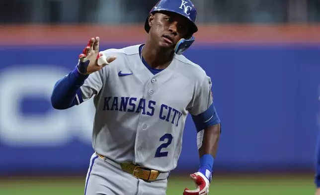 Kansas City Royals' Tyler Tolbert reacts after hitting a two-run home run during the second inning of a baseball game against the New York Mets, Tuesday, July 7, 2026, in New York. (AP Photo/Adam Hunger)
