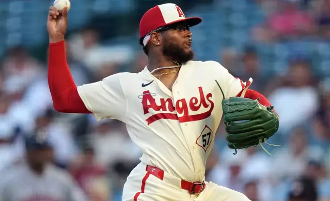Los Angeles Angels starting pitcher Walbert Urena delivers against the Houston Astros during the third inning of a baseball game Monday, July 27, 2026, in Anaheim, Calif. (AP Photo/Scott Strazzante)
