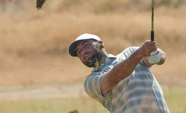 Scottie Scheffler of the United States plays from the rough on the 10th hole during a practice round for the British Open Golf championships at Royal Birkdale golf club, in Southport, England, Wednesday, July 15, 2026. (AP Photo/Jon Super)