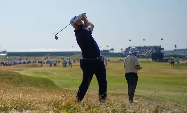 Jon Rahm of Spain plays out of the rough on the 10th fairway during a practice round for the British Open Golf championships at Royal Birkdale golf club, in Southport, England, Wednesday, July 15, 2026. (AP Photo/David Goldman)