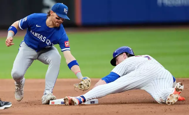 New York Mets' Brett Baty, right, steals second base in front of Kansas City Royals shortstop Bobby Witt Jr. during the fifth inning of a baseball game, Thursday, July 9, 2026, in New York. (AP Photo/Seth Wenig)