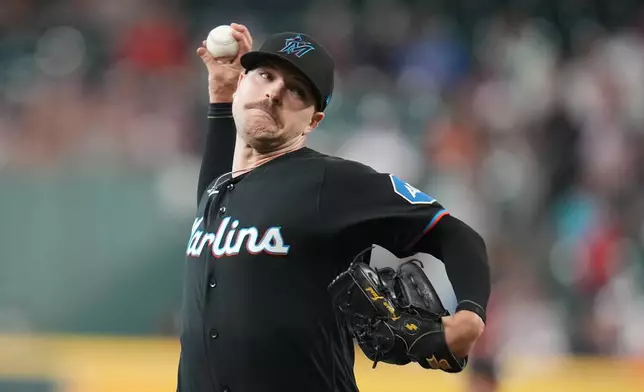 Miami Marlins starting pitcher Janson Junk delivers to Houston Astros' Yordan Alvarez during the first inning of a baseball game, Monday, July 20, 2026, in Houston. (AP Photo/Karen Warren)
