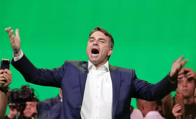 Brazilian Sen. Flavio Bolsonaro, the son of former President Jair Bolsonaro, arrives to the Liberal Party convention where he was confirmed as the party's presidential candidate, in Sao Paulo, Saturday, July 25, 2026. (AP Photo/Ettore Chiereguini)