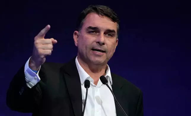 FILE - Presidential candidate Flavio Bolsonaro of the Liberal Party speaks at the "Brazil 2050: Industry on the presidential candidates agenda" event in Brasilia, Brazil, June 22, 2026. (AP Photo/Eraldo Peres, File)