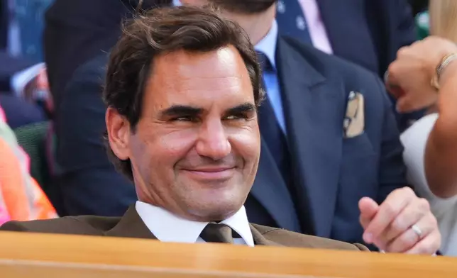 Former tennis player Roger Federer of Switzerland sits in the Royal Box on day eight at the Wimbledon Tennis Championships in London, Monday, July 6, 2026.(AP Photo/Kirsty Wigglesworth)