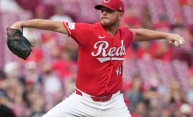 Cincinnati Reds pitcher Caleb Ferguson delivers during the first inning in the second baseball game of a doubleheader against the Cleveland Guardians, Tuesday, July 28, 2026, in Cincinnati. (AP Photo/Kareem Elgazzar)