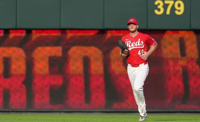 Cincinnati Reds pitcher Caleb Ferguson jogs in from the bullpen to start the second baseball game of a doubleheader against the Cleveland Guardians, Tuesday, July 28, 2026, in Cincinnati. (AP Photo/Kareem Elgazzar)