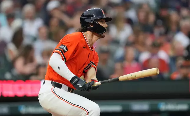 Detroit Tigers' James Outman hits a two-run triple against the Philadelphia Phillies during the sixth inning Friday, July 10, 2026, in Detroit. (AP Photo/Paul Sancya)