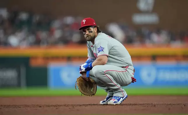 Philadelphia Phillies first baseman Bryce Harper plays against the Detroit Tigers during the third inning Friday, July 10, 2026, in Detroit. (AP Photo/Paul Sancya)