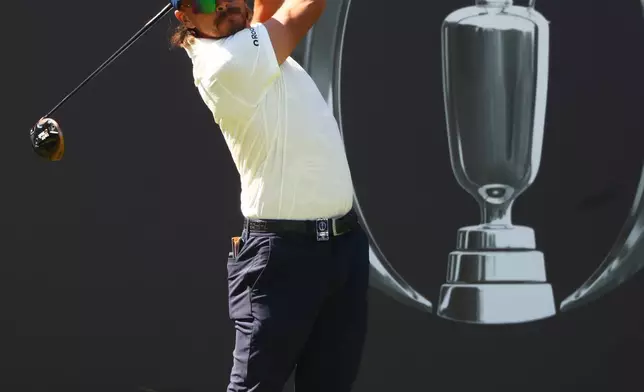 U.S. golfer Rickie Fowler tees off during a practice round at the British Open Golf Championship at Royal Birkdale, Southport, England, Monday, July 13, 2026. (AP Photo/Peter Morrison)