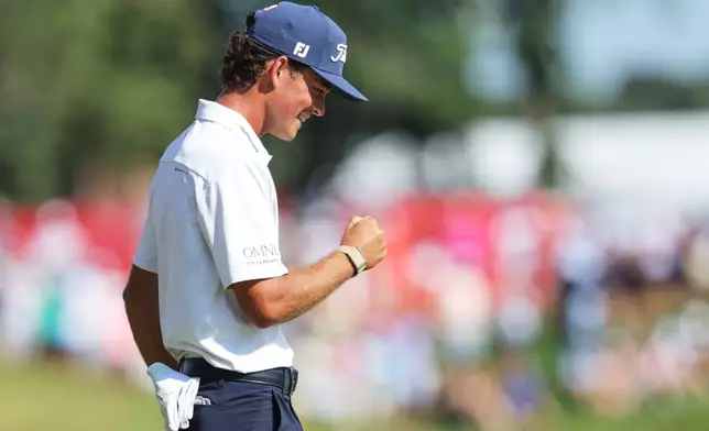 Jackson Koivun reacts after winning the 3M Open golf tournament at the Tournament Players Club Sunday, July 26, 2026, in Blaine, Minn. (AP Photo/Bailey Hillesheim)