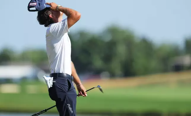 Jackson Koivun reacts after winning the 3M Open golf tournament at the Tournament Players Club Sunday, July 26, 2026, in Blaine, Minn. (AP Photo/Bailey Hillesheim)