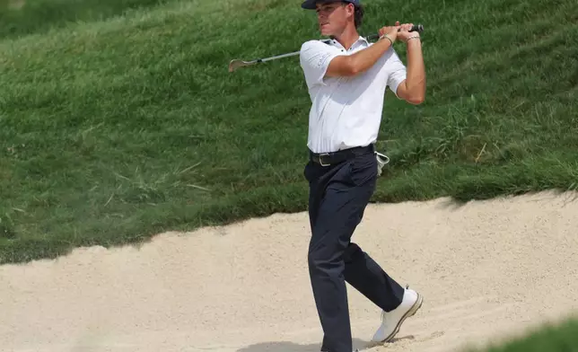 Jackson Koivun hits on the ninth hole during the final round of the 3M Open golf tournament at the Tournament Players Club Sunday, July 26, 2026, in Blaine, Minn. (AP Photo/Bailey Hillesheim)