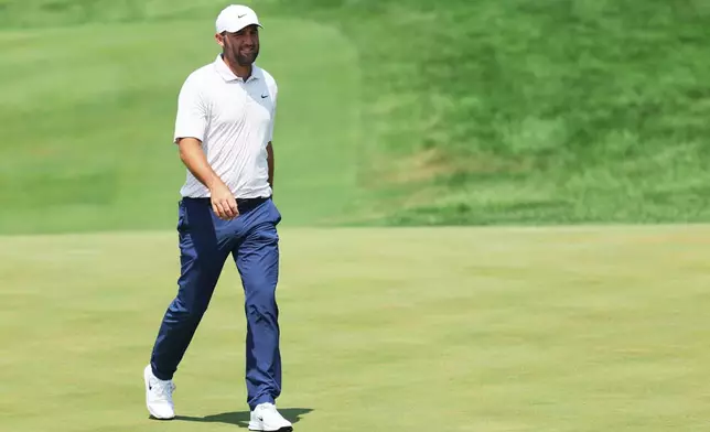 Scottie Scheffler walks on the ninth green during the final round of the 3M Open golf tournament at the Tournament Players Club Sunday, July 26, 2026, in Blaine, Minn. (AP Photo/Bailey Hillesheim)
