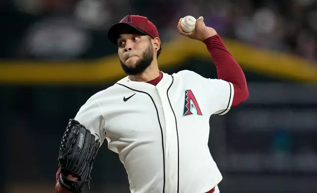 Arizona Diamondbacks starting pitcher Eduardo Rodriguez throws against the St. Louis Cardinals during the first inning of a baseball game, Sunday, July 19, 2026, in Phoenix. (AP Photo/Ross D. Franklin)