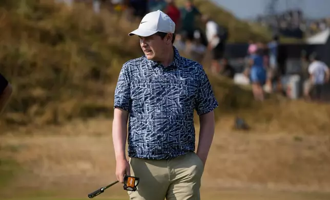 Robert MacIntyre of Scotland looks at his putt on the 11th green during the third day of the British Open Golf championships at Royal Birkdale golf club, in Southport, England, Saturday, July 18, 2026. (AP Photo/David Goldman)