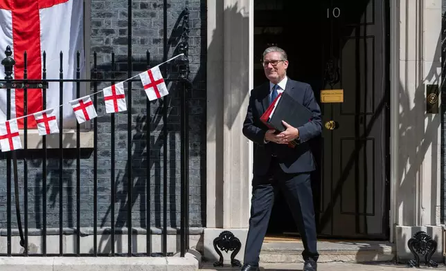 Britain's Prime Minister Keir Starmer leaves 10 Downing Street to attend Prime Minister's Questions at the House of Commons in London, Wednesday, July 15, 2026. (AP Photo/Thomas Krych)