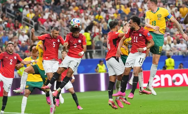 Egypt's Mohamed Hany scores an own goal with a header during a World Cup round of 32 soccer match against Australia in Arlington, Texas, near Dallas, Friday, July 3, 2026. (AP Photo/Julio Cortez)