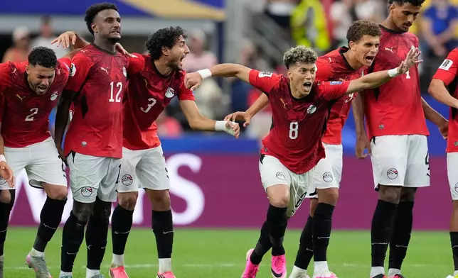 Egypt players react during a penalty shootout against Australia for the World Cup round of 32 soccer match in Arlington, Texas, near Dallas, Friday, July 3, 2026. (AP Photo/Tony Gutierrez)
