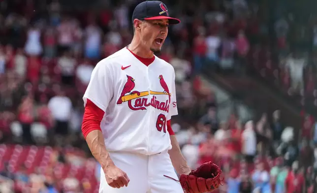 St. Louis Cardinals pitcher Riley O'Brien celebrates after getting Miami Marlins' Javier Sanoja to ground out for the final out of a baseball game Sunday, June 28, 2026, in St. Louis. (AP Photo/Jeff Roberson)