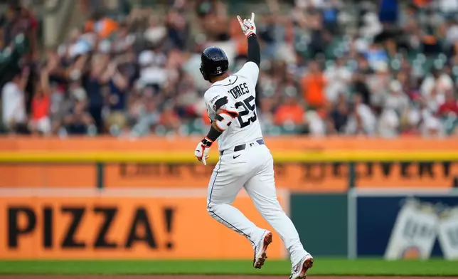 Detroit Tigers' Gleyber Torres reacts to his two-run home run against the Baltimore Orioles during the fourth inning of a baseball game Tuesday, July 28, 2026, in Detroit. (AP Photo/Paul Sancya)