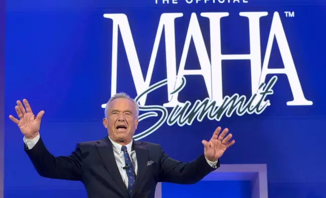 FILE - Health and Human Services Secretary Robert F. Kennedy, Jr., arrives on stage at the inaugural Make America Healthy Again summit, Nov. 12, 2025, in Washington. (AP Photo/Rod Lamkey, Jr., File)