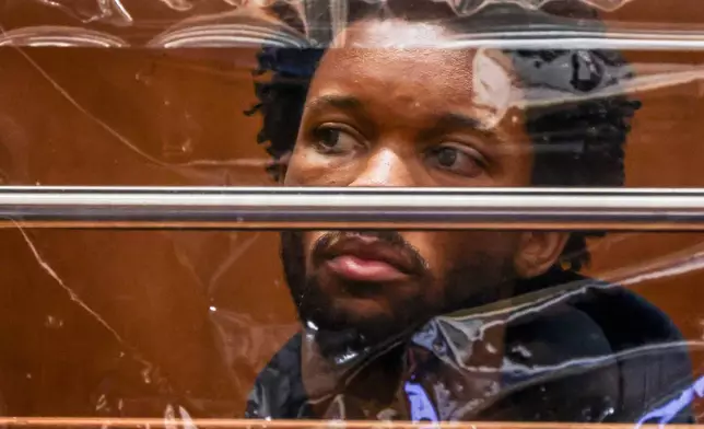 FILE - David Anthony Burke, whose stage name is D4vd, is arraigned in Los Angeles, April 20, 2026, on charges of killing a 14-year-old girl whose dismembered body was found in his car. (Ted Soqui/Pool Photo via AP, File)