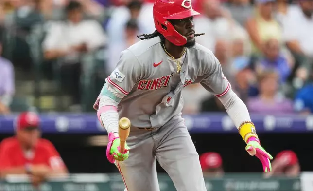 Cincinnati Reds' Elly de la Cruz heads up the first-base line after hitting a single off Colorado Rockies starting pitcher Gabriel Hughes in the fifth inning of a baseball game Friday, July 17, 2026, in Denver. (AP Photo/David Zalubowski)