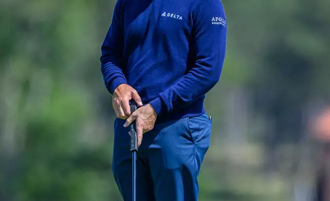 Patrick Cantlay, of the United States, plays on the ninth green during day one of the Genesis Scottish Open 2026 at The Renaissance Club in North Berwick, Scotland, Thursday, July 9, 2026. (Malcolm Mackenzie/PA via AP)