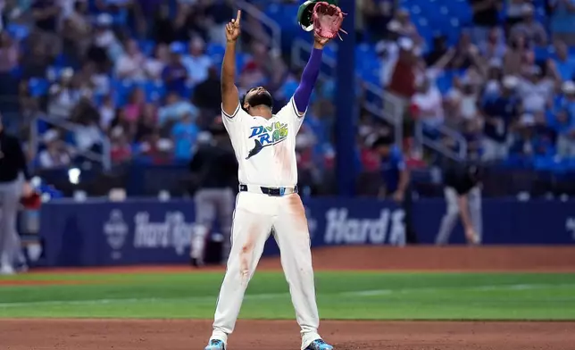 Tampa Bay Rays third baseman Junior Caminero reacts after the team defeated theCleveland Guardians during a baseball game Saturday, July 25, 2026, in St. Petersburg, Fla. (AP Photo/Chris O'Meara)