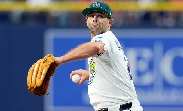 Tampa Bay Rays pitcher Nick Martinez goes into his windup against the Cleveland Guardians during the first inning of a baseball game Saturday, July 25, 2026, in St. Petersburg, Fla. (AP Photo/Chris O'Meara)