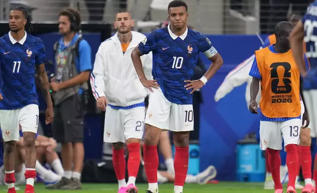 France's Kylian Mbappe (10) gestures after the World Cup semifinal soccer match between France and Spain in Arlington, Texas, near Dallas, Tuesday, July 14, 2026. (AP Photo/Abbie Parr)