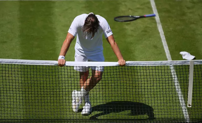 Arthur Fery of Britain reacts after winning the second round men's singles match against Otto Virtanen of Finland at the Wimbledon Tennis Championships in London, Thursday, July 2, 2026.(AP Photo/Kin Cheung)