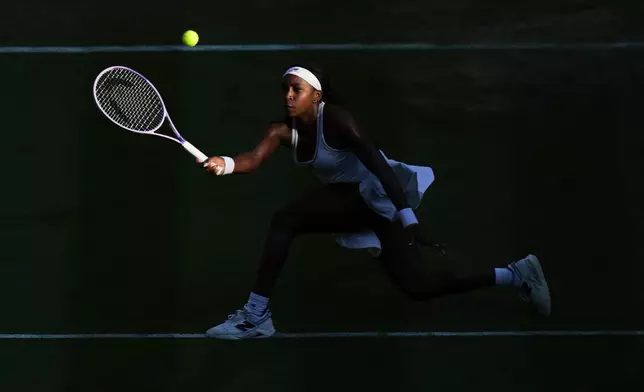 Coco Gauff of the United States plays a return during the third round women's singles match against Claire Liu of the United States at the Wimbledon Tennis Championships in London, Friday, July 3, 2026.(AP Photo/Brian Inganga)