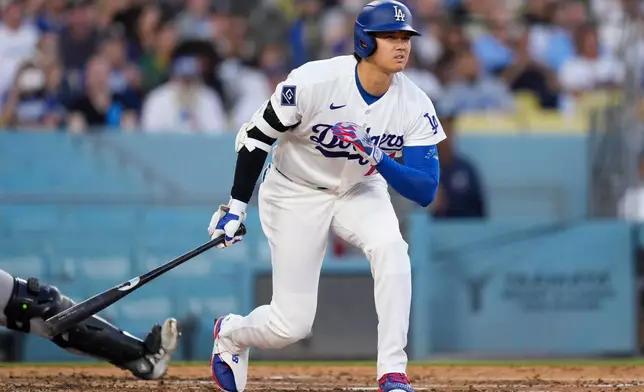 Los Angeles Dodgers' Shohei Ohtani watches a foul ball go out during the third inning of a baseball game against the Colorado Rockies, Tuesday, July 7, 2026, in Los Angeles. (AP Photo/Mark J. Terrill)