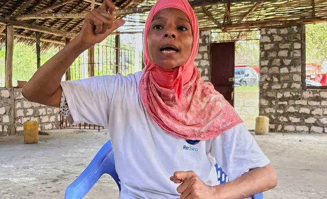 Nuru Mohammed, a fisherwoman speaks inside an unfinished restaurant being built by a women's group of fishmongers in Sabaki, Malindi, Kenya, on June 15, 2026. (AP Photo/Allan Olingo)