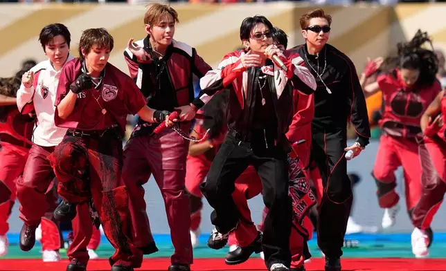 South Korean boy band BTS perform during the halftime show of the World Cup final soccer match between Spain and Argentina in East Rutherford, N.J., near New York, Sunday, July 19, 2026. (AP Photo/Ashley Landis)
