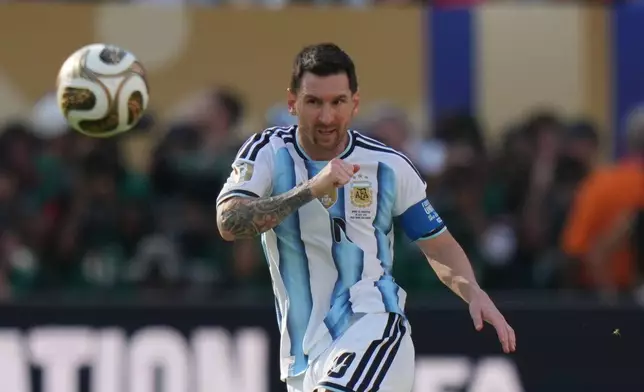 Argentina's Lionel Messi (10) kicks the ball during the World Cup final soccer match between Spain and Argentina in East Rutherford, N.J., near New York, Sunday, July 19, 2026. (AP Photo/Stephanie Scarbrough)