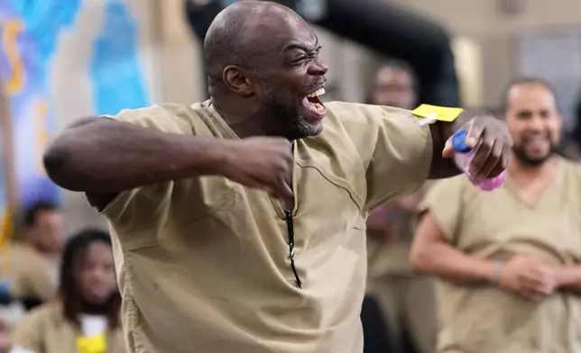 Rikers Island inmate Ralph Veal celebrates as England scores during the World Cup semifinal soccer match between England and Argentina, at the jail complex in New York, Wednesday, July 15, 2026. (AP Photo/Seth Wenig)