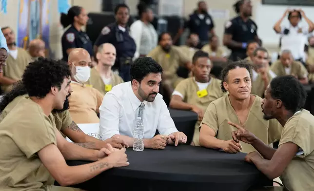 New York City Mayor Zohran Mamdani speaks with Rikers Island inmates as they watch the World Cup semifinal soccer match between England and Argentina, at the jail complex in New York, Wednesday, July 15, 2026. (AP Photo/Seth Wenig)