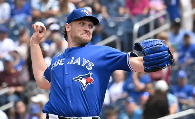 Toronto Blue Jays starting pitcher Trey Yesavage (39) throws to a Chicago White Sox batter during first inning MLB baseball action in Toronto on Sunday, July 19, 2026. (Jon Blacker/The Canadian Press via AP)