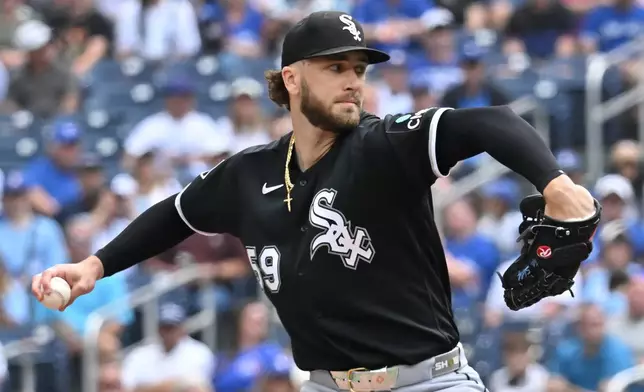 Chicago White Sox starting pitcher Sean Burke (59) throws to a Toronto Blue Jays batter during first inning MLB baseball action in Toronto on Sunday, July 19, 2026. (Jon Blacker/The Canadian Press via AP)