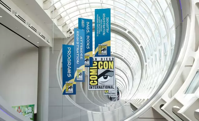 FILE - Signage appears during Comic-Con International in San Diego on July 26, 2024. (Photo by Christy Radecic/Invision/AP, FIle)
