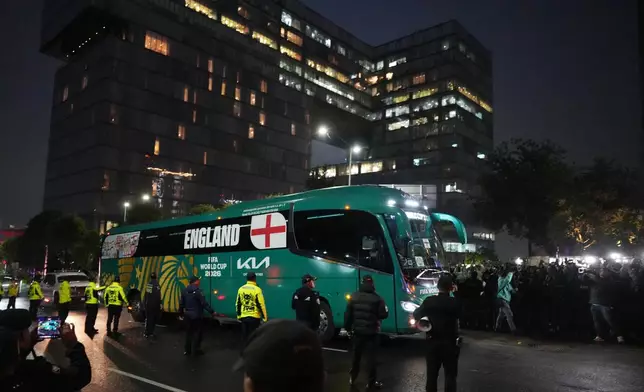 The England team bus arrives at a hotel in Mexico City ahead of England's World Cup round of 16 soccer match against Mexico, Friday, July 3, 2026. (AP Photo/Eduardo Verdugo)