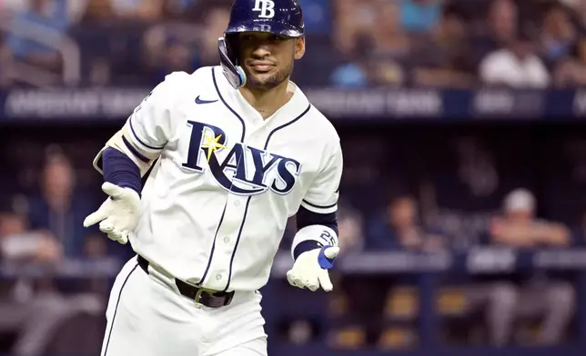 Tampa Bay Rays' Victor Mesa Jr. reacts to his home run during the fifth inning of a baseball game against the Seattle Mariners Friday, July 10, 2026, in St. Petersburg, Fla. (AP Photo/Jason Behnken)