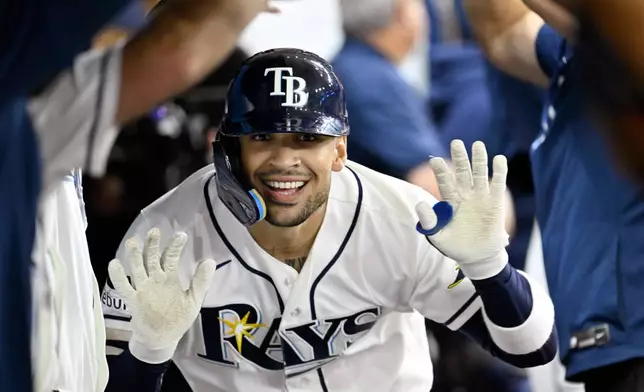 Tampa Bay Rays' Victor Mesa Jr. celebrates after his home run during the fifth inning of a baseball game against the Seattle Mariners, Friday, July 10, 2026, in St. Petersburg, Fla. (AP Photo/Jason Behnken)