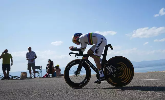 Belgium's Remco Evenepoel rides during the sixteenth stage of the Tour de France cycling race, an indivdual time-trial with start in Evian-Les-Bains and finish in Thonon-les-Bains, France, Tuesday, July 21, 2026. (AP Photo/Thibault Camus)
