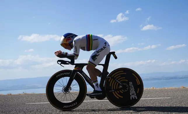 Belgium's Remco Evenepoel rides during the sixteenth stage of the Tour de France cycling race, an indivdual time-trial with start in Evian-Les-Bains and finish in Thonon-les-Bains, France, Tuesday, July 21, 2026. (AP Photo/Thibault Camus)
