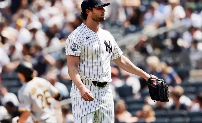 New York Yankees pitcher Gerrit Cole reacts after giving up a two-run home run to Pittsburgh Pirates' Jacob Gonzalez (26) in the fifth inning during the first baseball game of a doubleheader, Wednesday, July 22, 2026, in New York. (AP Photo/Adam Hunger)