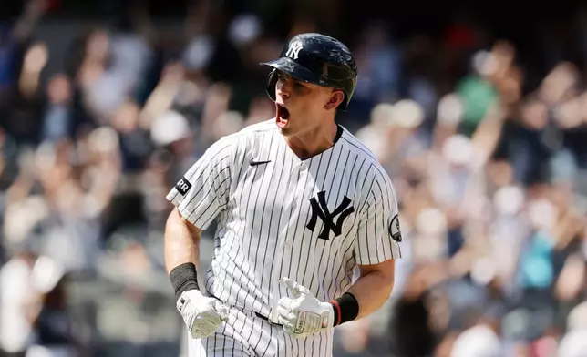 New York Yankees' Ben Rice reacts after hitting a three-run home run in the seventh inning during the first baseball game of a doubleheader against the Pittsburgh Pirates, Wednesday, July 22, 2026, in New York. (AP Photo/Adam Hunger)
